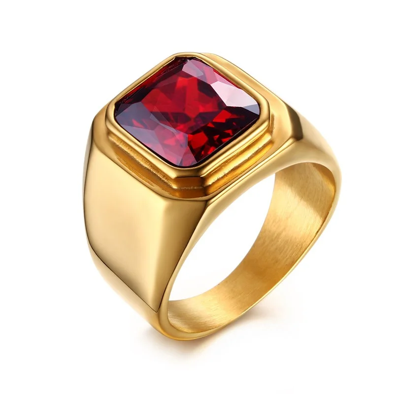 bague en or avec pierre précieuse rouge